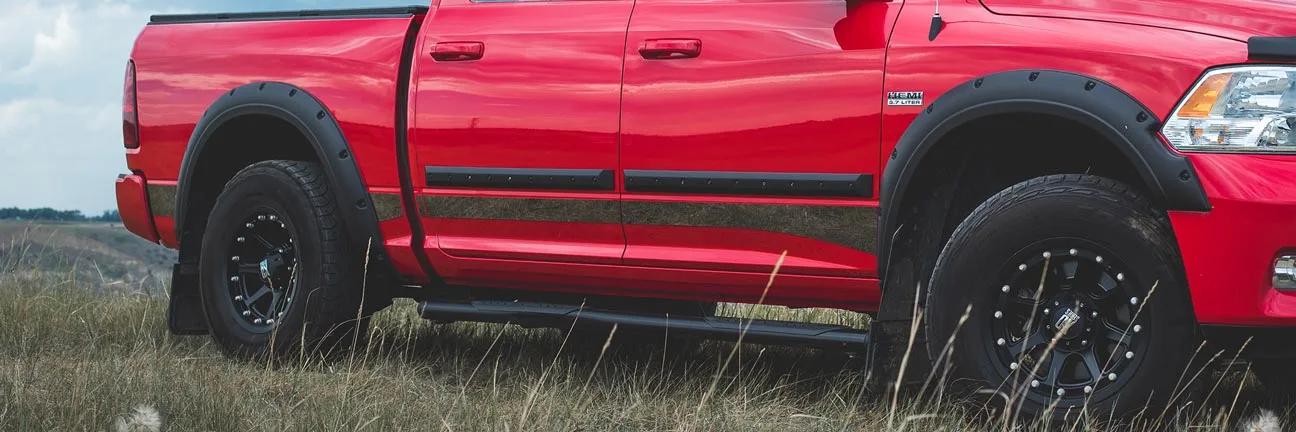 EGR body side mouldings installed on a red truck